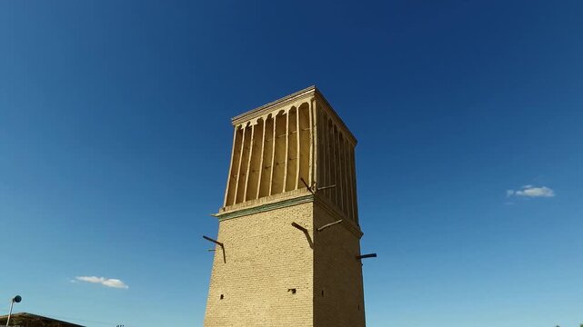 A professional stock footage featuring tall windcatcher captured in high definition, perfect for commercial projects, travel documentaries, and background