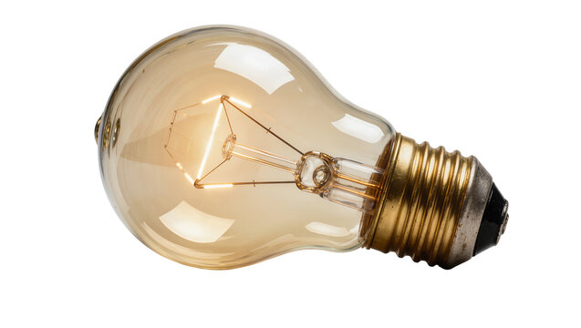 Glowing amber incandescent light bulb with brass base, isolated on transparent background