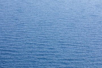 The exquisite texture of a sun-drenched, gently undulating sea. © robsonphoto
