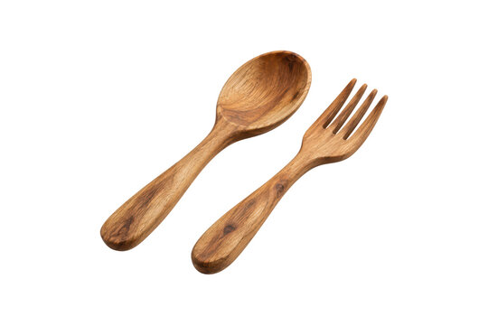 Polished wooden spoon and fork pair with natural wood grain and rustic handcrafted texture, isolated on a clean white background, ideal for kitchenware, dining, sustainable living, and eco-friendly 