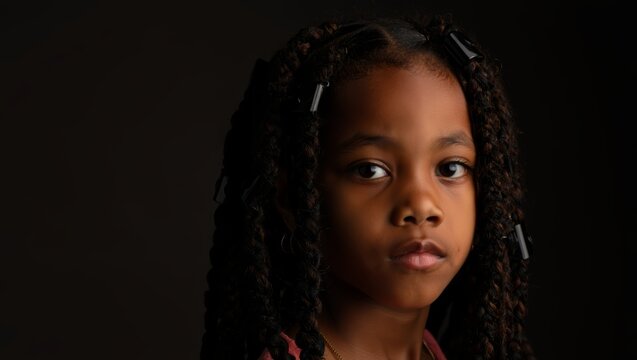 Portrait of a Young Girl with Braids