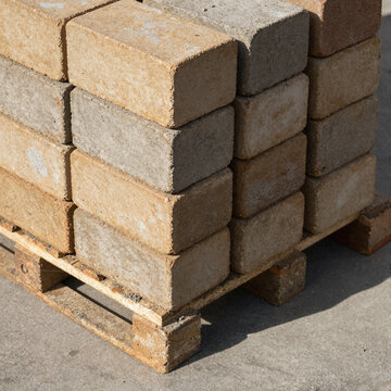 Pallet of refractory firebricks with mortar dust
