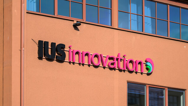 Gothenburg, Sweden - July 21 2026: IUS Innovation company sign on industrial building facade.