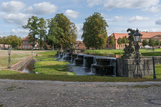 Historic Great Cascade in Ludwigslust Palace Park Under Cloudy Sky