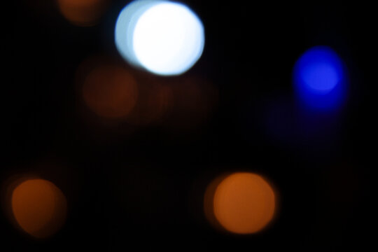 Colorful bokeh lights on black background
