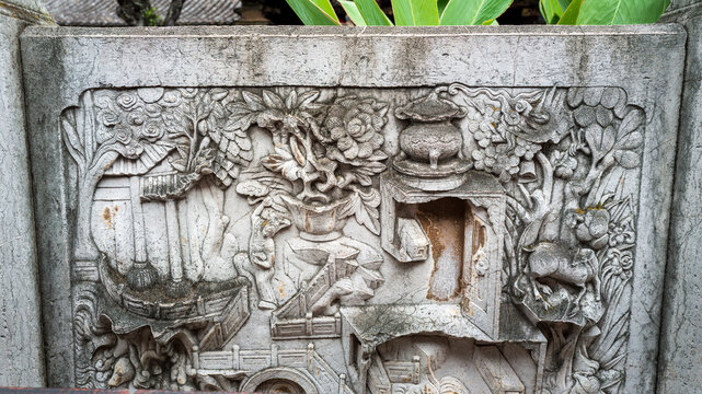 Exquisite ancient stone relief carving at Zhu Family Garden, Jianshui, Yunnan, China