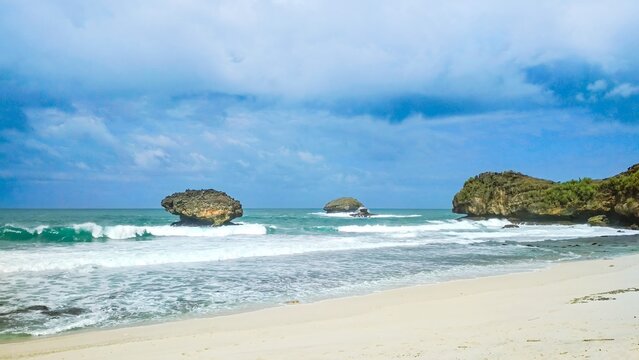 Srau Beach Landscape with White Sand and Rocky Formations in Pacitan East Java Indonesia
