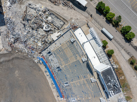 Orchard Park, New York, United States - 19 July 2026: Aerial view of the demolition of the former Highmark Stadium, showing debris and structural remains of the seating area in the east end zone.