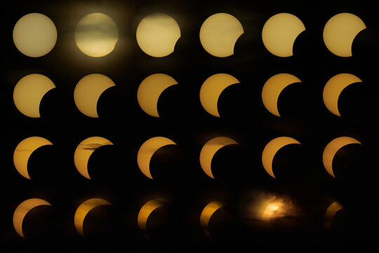 Eclipse of Sun, August 12, 2026. The sun is a gold dish in the sky gradually covered by the moon.