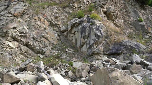 Pan shot, rock formations, geologogical layers in the Carpathian mountains.
