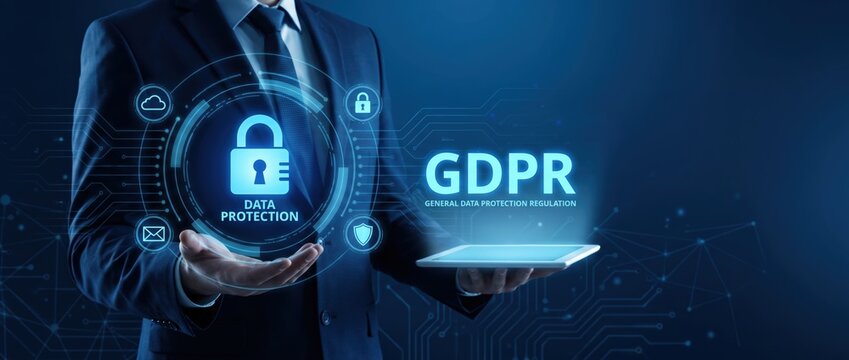 Confident business professional holding a tablet with a backdrop highlighting gdpr data protection focusing on the importance of security and privacy in today's digital landscape.
