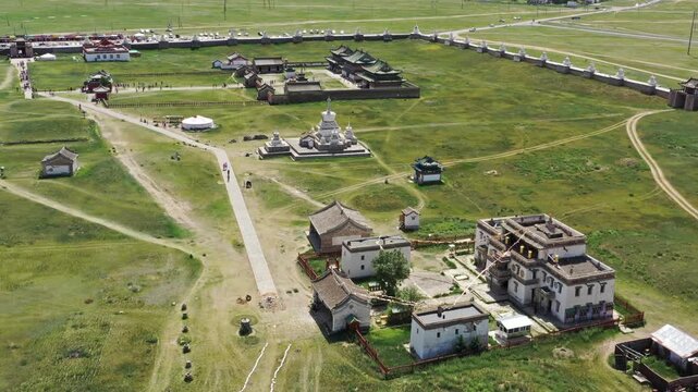 Aerial view of Erdene Zuu Monastery with its historic stupas and temple buildings surrounded by grassy plains in Kharkhorin, Ovorkhangai, Mongolia.