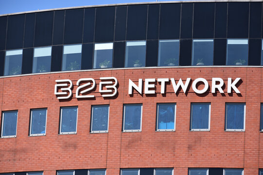 B2B Network company office building with signage, logo on the facade. WARSAW, POLAND - APRIL 18, 2026