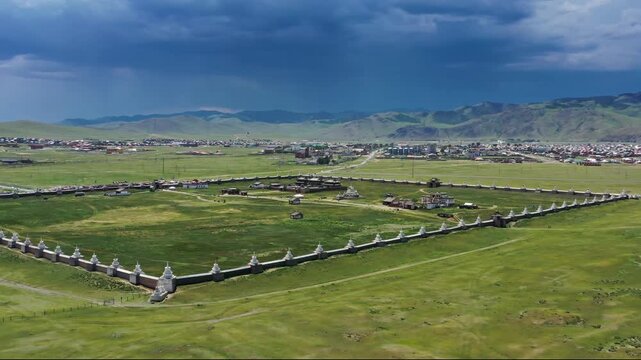Aerial view of Erdene Zuu Monastery surrounded by historic walls and green fields in Kharkhorin, Ovorkhangai, Mongolia.