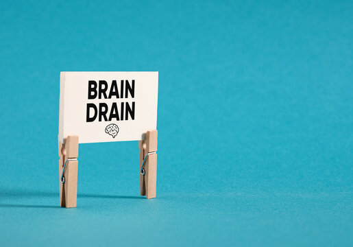 Brain drain concept showing talent loss and emigration