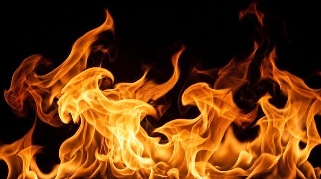 Abstract background of blazing fire flames flickering against a pitch black backdrop
