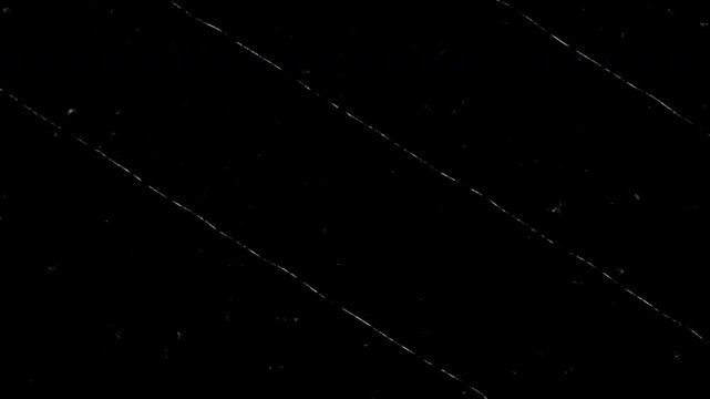 Black grunge texture old film scratches distressed background minimalist dark vintage noise overlay for cinematic video editing and graphic design.