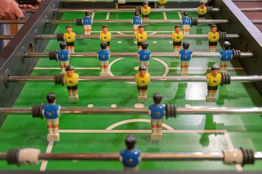foosball table in a close up of the field
