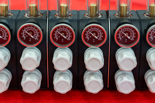 Industrial thermal fluid heating or cooling system manifold with precision temperature gauges and control valves