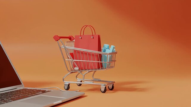 銀色のショッピングカートに赤い買い物袋と商品が入り横にパソコンが置かれる