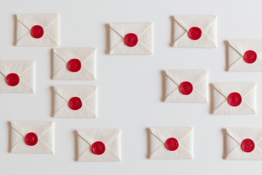 White Envelopes with Red Wax Seals