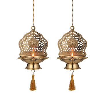 Pair of hanging brass oil lamps with ornate filigree backplates and tassels isolated on a transparent background
