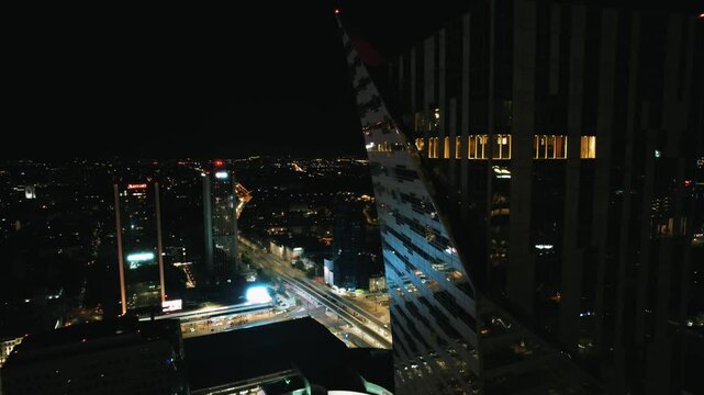 Warsaw Skyscrapers and City Streets Aerial Drone Night View