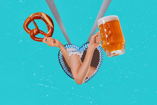 Solid German pint glass filled with fresh yellow beer and pretzel, held in a woman's hand. Oktoberfest concept with copy space.