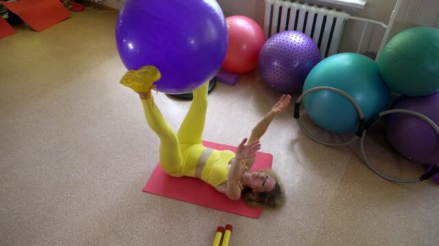 Exercising with a fitness ball for core strength