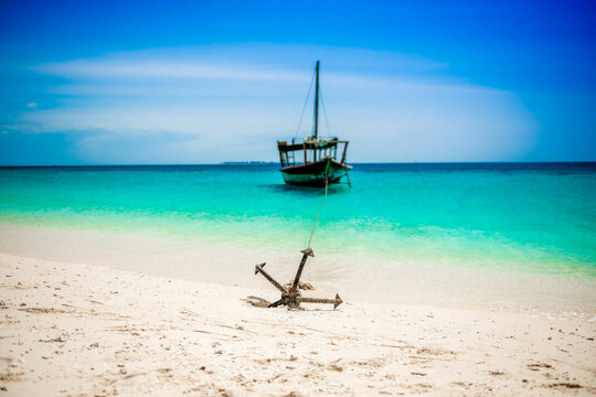 Boats Anchoring On The Ocean Shore In Zanzibar