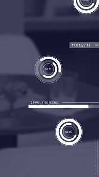 Animation of multiple graphs, loading circles, graphs over unoccupied chairs with glasses of water