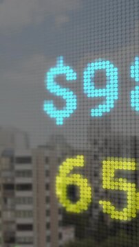 Animating stock market numbers over cityscape background