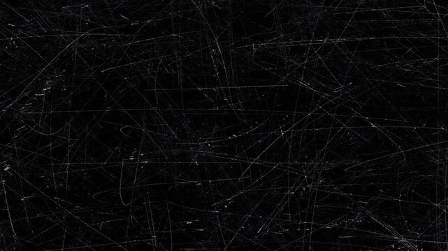 Scratches and dust dark grunge paper background. Scratched damaged dynamic overlay texture surface in trendy vintage stop motion style. 4k black grunge gritty abstract background loop animation.