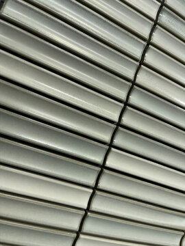 Red Steel Structural Frame Viewed from Below Between Buildings