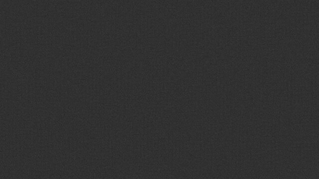Dark gray fine grain film noise texture background featuring a consistent stippled effect for digital overlays and cinematic post-production.