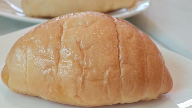 Fresh Salt Bread on a White Plate 
