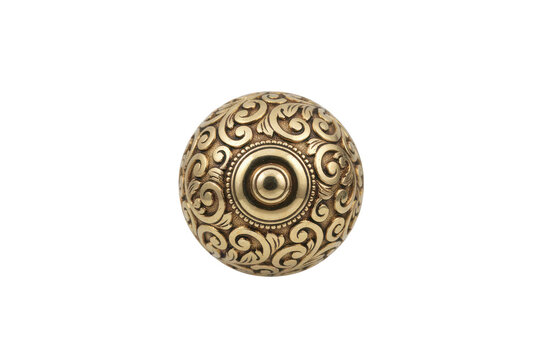 Antique brass cabinet knob with ornate filigree swirl patterns and a smooth circular center detail isolated on a transparent background