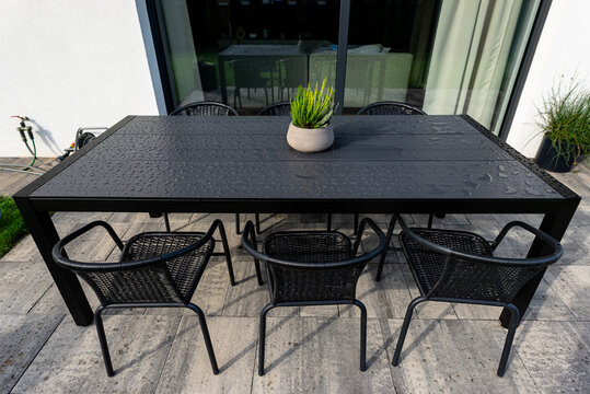 Modern garden dining table with water drops