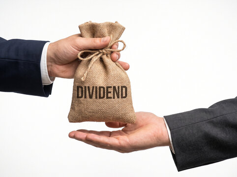 Businessman hands giving a burlap money bag with dividend text to an investor isolated on white background