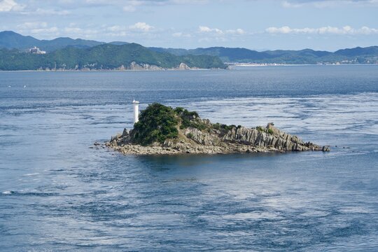A view of a small island floating in the Naruko Strait