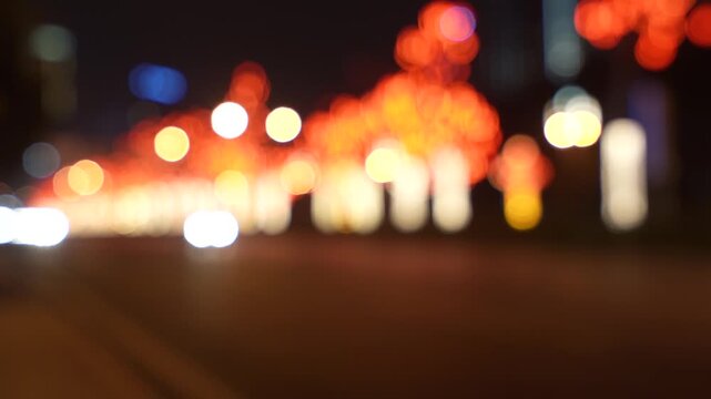 Bokeh lights night city street blurred cars