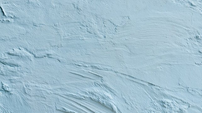 The Blue Textured Plaster Wall Surface with Subtle Shadows and Depth