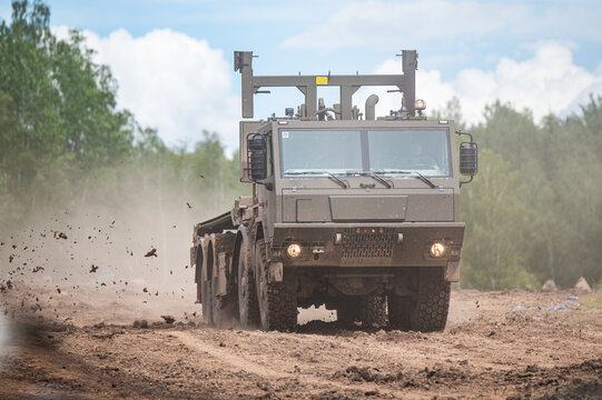 Military Truck Driving through Mud 