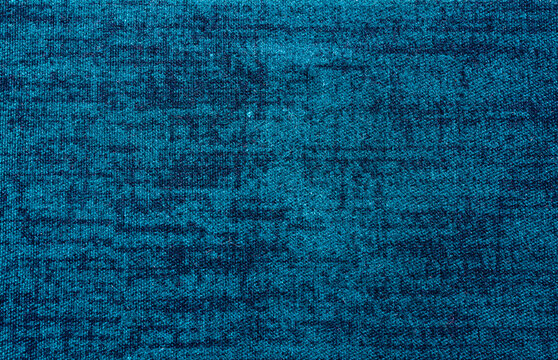 Vibrant peacock teal woven fabric texture showcasing a rich blue green textile background with a subtle crosshatch pattern