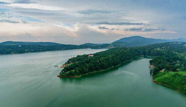 Aerial view of Beautiful Umiam Lake, also known as Bara Pani. It is a mesmerizing man-made reservoir that is encircled by lush green East Khasi hills in Shillong, Meghalaya, India.