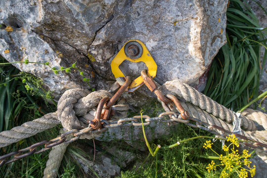 Anchoring point securing boat ropes and chains to rock