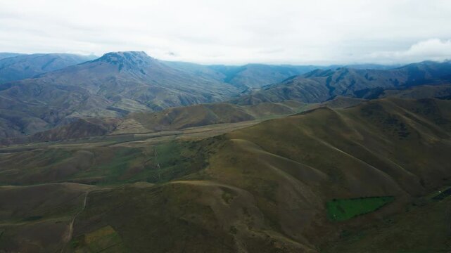 Scenic mountain near Kegen and Narynkol in Almaty Region, Kazakhstan, leading toward the China border. Majestic Tien Shan peaks, wide valleys and untouched landscapes create an impressive road tr