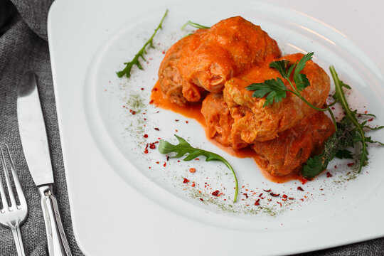 Traditional Stuffed Cabbage Rolls with Meat and Rice in Rich Tomato Sauce