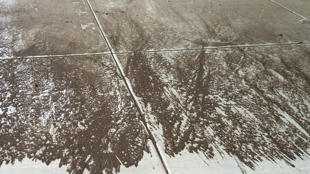 Volcanic Ash Debris on Tiled Floor After Anak Krakatau Eruption