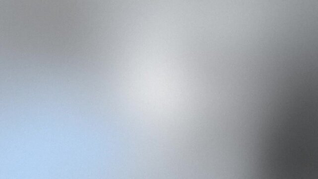 Abstract silver and gray gradient light texture with subtle grain for cinematic video backgrounds, overlays and modern design, minimalist backdrops, and digital presentations